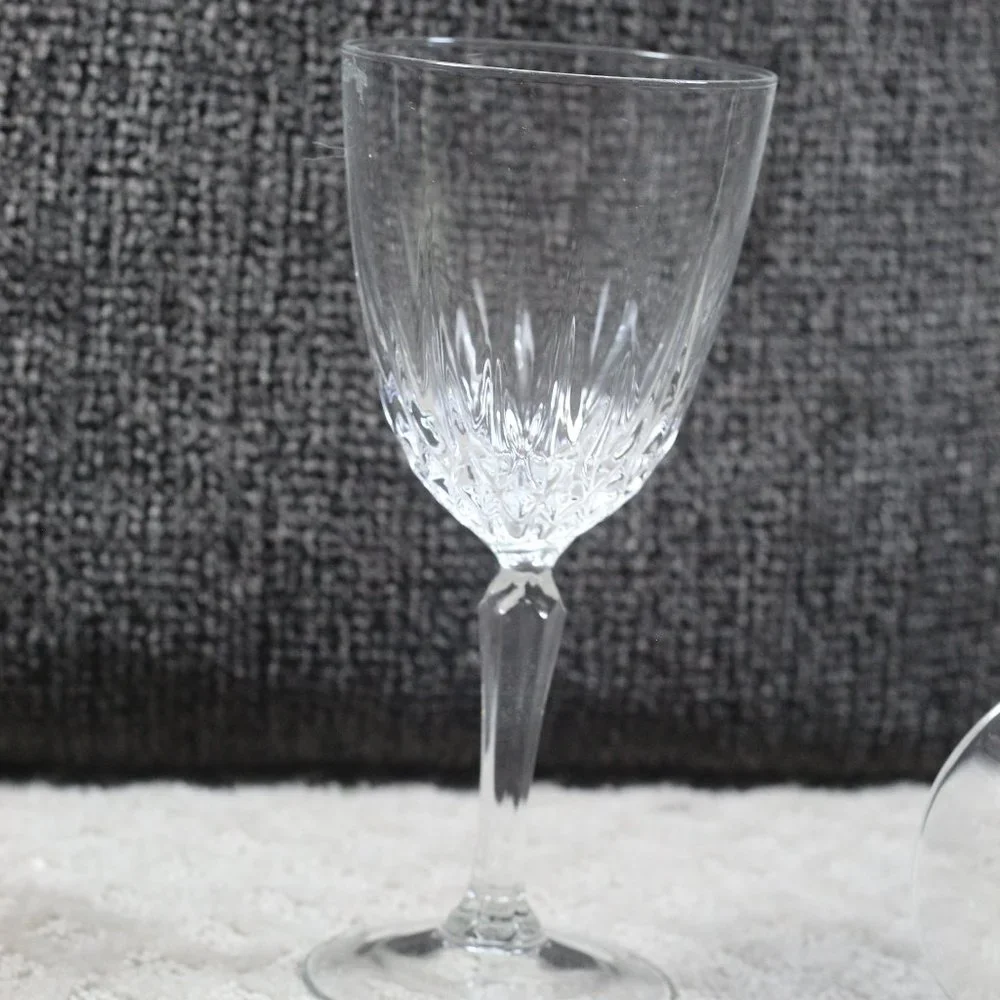 Elegant set of two stemmed cut glass wine glasses